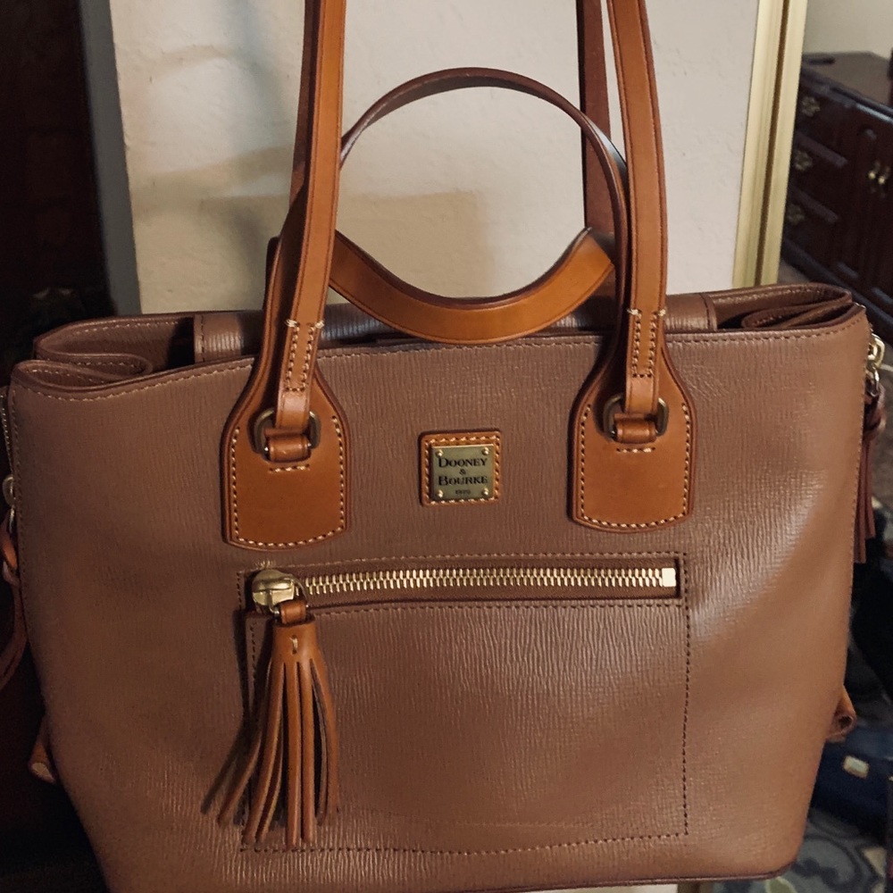 Dooney & Bourke brown leather purse with tassels